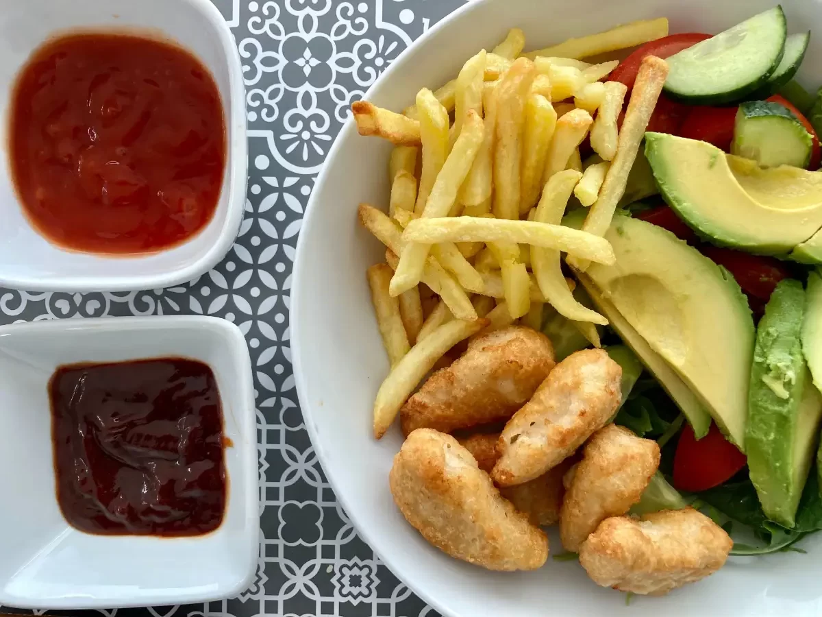 Air fried fries, chicken dippers, dips and salad